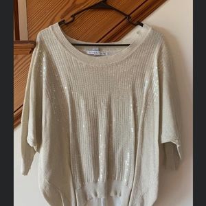 Cream colored sequin top. Size small.